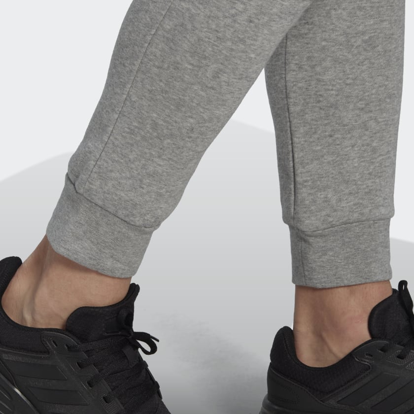 شلوار خاکستری رنگ آدیداس مدل ESSENTIALS FLEECE REGULAR TAPERED JOGGERS