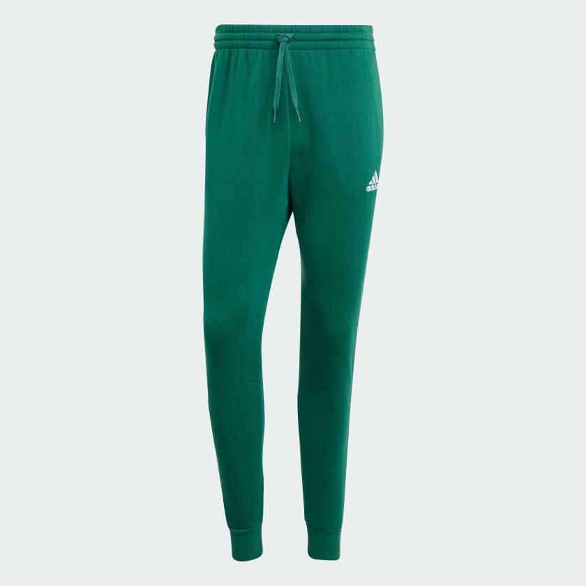 شلوار سبز رنگ آدیداس مدل ESSENTIALS FLEECE REGULAR TAPERED JOGGERS