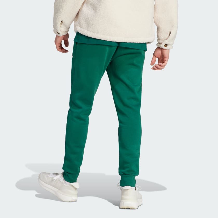 شلوار سبز رنگ آدیداس مدل ESSENTIALS FLEECE REGULAR TAPERED JOGGERS