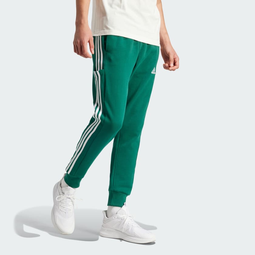 شلوار سبز، سفید آدیداس مدل ESSENTIALS FRENCH TERRY TAPERED CUFF 3-STRIPES JOGGERS