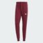 شلوار قرمز، سفید آدیداس مدل ESSENTIALS FRENCH TERRY TAPERED CUFF 3-STRIPES JOGGERS