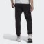 شلوار مشکی آدیداس مدل ESSENTIALS FLEECE REGULAR TAPERED JOGGERS