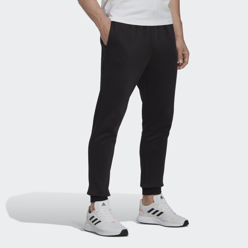 شلوار مشکی آدیداس مدل ESSENTIALS FLEECE REGULAR TAPERED JOGGERS