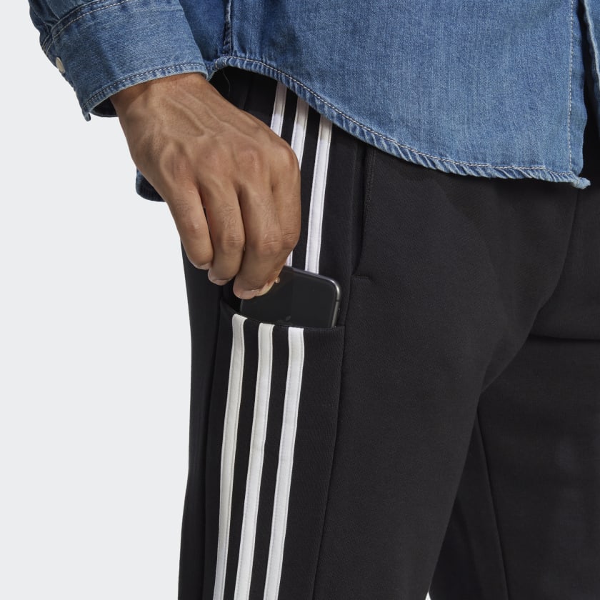 شلوار مشکی، سفید آدیداس مدل ESSENTIALS FRENCH TERRY TAPERED CUFF 3-STRIPES JOGGERS