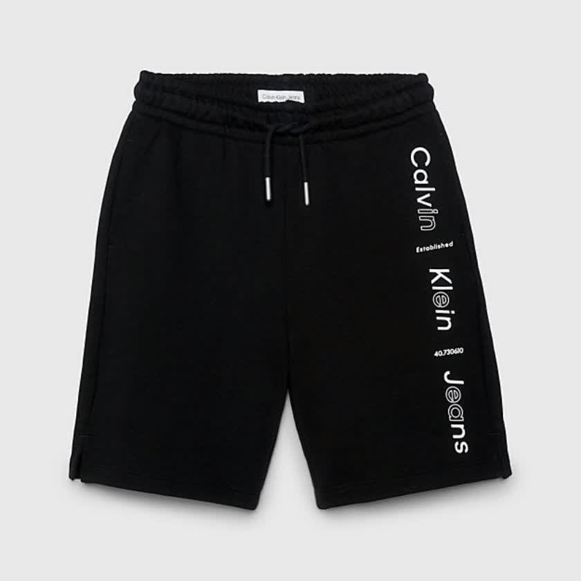 شلوارک نوجوانی مشکی کلوین کلین مدل Relaxed Logo Terry Jogger Shorts